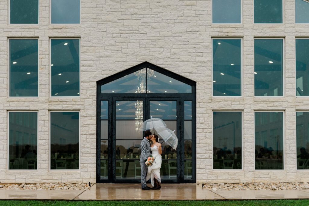 Jenna & Caleb's rainy spring Wedding at The Ranch House in Caldwell Texas with Rachel Driskell Photography