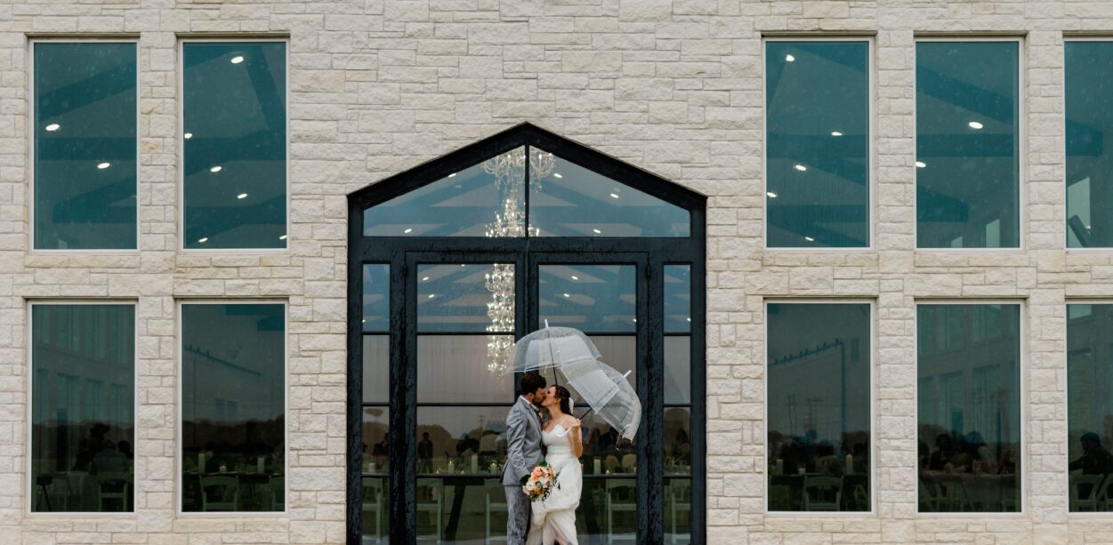 Jenna & Caleb's rainy spring Wedding at The Ranch House in Caldwell Texas with Rachel Driskell Photography
